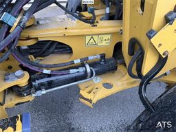 Caterpillar 908M wheel loader with pallet forks and bucket