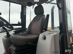 Caterpillar 908M wheel loader with pallet forks and bucket