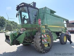 John Deere W540 mit Raspvorsatz