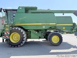 John Deere W540 mit Raspvorsatz