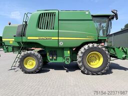 John Deere W540 mit Raspvorsatz