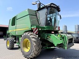 John Deere W540 mit Raspvorsatz