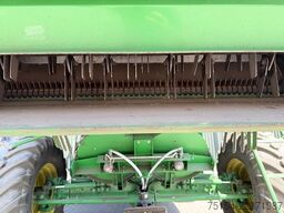 John Deere W540 mit Raspvorsatz