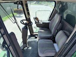 John Deere W540 mit Raspvorsatz