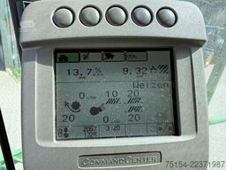 John Deere W540 mit Raspvorsatz