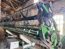 John Deere W540 mit Raspvorsatz