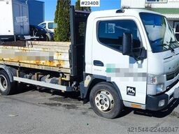 Mitsubishi Fuso Canter 4x2 flatbed truck for sale as a repair