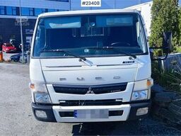 Mitsubishi Fuso Canter 4x2 flatbed truck for sale as a repair