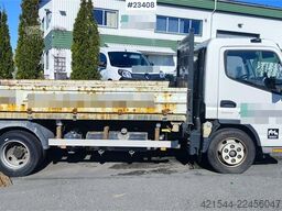 Mitsubishi Fuso Canter 4x2 flatbed truck for sale as a repair