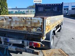 Mitsubishi Fuso Canter 4x2 flatbed truck for sale as a repair