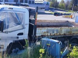 Mitsubishi Fuso Canter 4x2 flatbed truck for sale as a repair