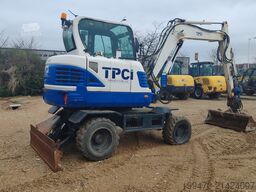 Hyundai R55W-9A with 3 excavator buckets