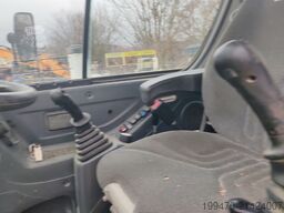 Hyundai R55W-9A with 3 excavator buckets