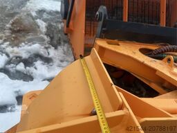 Schmidt folding wing snow plough