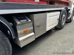 Scania R580 8x2 flatbed truck