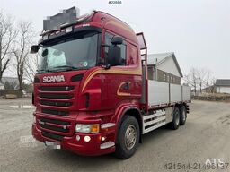 Scania R560 6x2 flatbed truck with setup for a rear-mount