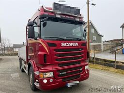 Scania R560 6x2 flatbed truck with setup for a rear-mount
