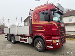 Scania R560 6x2 flatbed truck with setup for a rear-mount