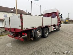 Scania R560 6x2 flatbed truck with setup for a rear-mount