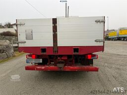 Scania R560 6x2 flatbed truck with setup for a rear-mount