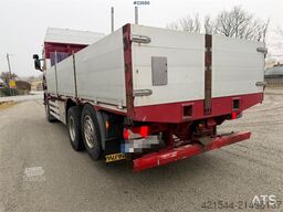Scania R560 6x2 flatbed truck with setup for a rear-mount