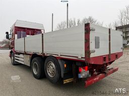 Scania R560 6x2 flatbed truck with setup for a rear-mount