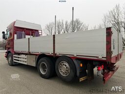 Scania R560 6x2 flatbed truck with setup for a rear-mount