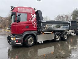 Scania R580 6x4 snowplow equipped tipping truck with a 20