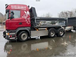 Scania R580 6x4 snowplow equipped tipping truck with a 20