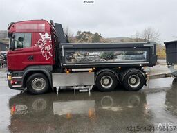Scania R580 6x4 snowplow equipped tipping truck with a 20