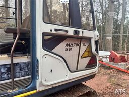 Kobelco SK60 crawler excavator with bucket