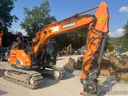 Doosan DX140LCR-5 with PowerTilt OQ65 quickcoupler (without bucket)