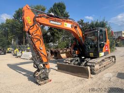Doosan DX140LCR-5 with PowerTilt OQ65 quickcoupler (without bucket)