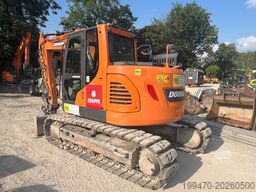 Doosan DX140LCR-5 with PowerTilt OQ65 quickcoupler (without bucket)