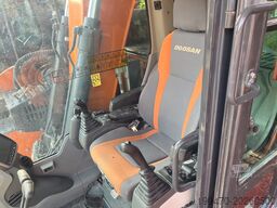 Doosan DX140LCR-5 with PowerTilt OQ65 quickcoupler (without bucket)