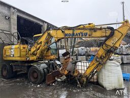 Komatsu PW160-7H wheeled excavator, a repair object withou