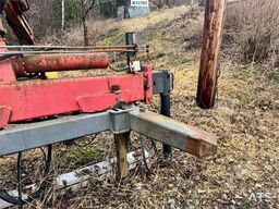 HMF Hermeler Maschinenbau 1150 crane with grab.