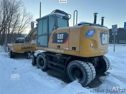 CAT M314F wheeled excavator w/ two buckets, Gigant tra