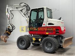 Takeuchi TB 295 W Engcon Draaikantelstuk