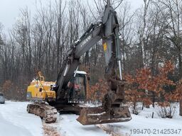 Volvo EC250DNL with 3 excavator buckets