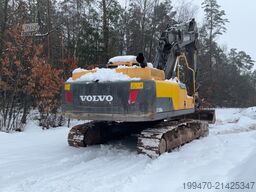 Volvo EC250DNL with 3 excavator buckets