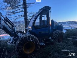 Rottne H8E harvester with harvesting unit and chains.