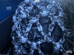 Rottne H8E harvester with harvesting unit and chains.