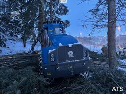 Rottne H8E harvester with harvesting unit and chains.
