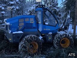 Rottne H8E harvester with harvesting unit and chains.