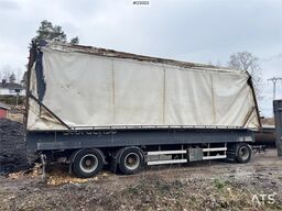 Tyllis wood chip trailer with hydraulic roof.