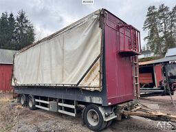 Tyllis wood chip trailer with hydraulic roof.