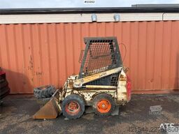 Bobcat 34.3 skid steer loader w/ extra tires and bucket.