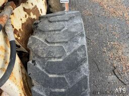 Bobcat 34.3 skid steer loader w/ extra tires and bucket.