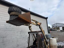 Bobcat 34.3 skid steer loader w/ extra tires and bucket.